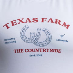 Camiseta Feminina Texas Farm Baby Look Manga Curta Branco Estampada Em Vermelho E Azul Ref:CF349