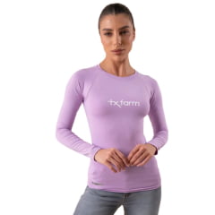Camiseta Feminina Texas Farm Manga Longa UV50+ Roxo Orquídea Com Logo Branco Ref:UVF001 Camiseta Feminina Texas Farm Manga Longa UV50+ Roxo Orquídea Com Logo Branco Ref:UVF001